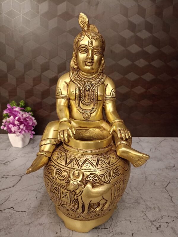 Brass Balakrishnar sitting on Milk pot at Wholesale Dealer