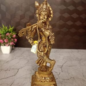 Brass Lord Krishna on Floral Base at Wholesale Market